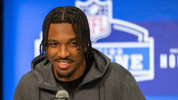 Mar 1, 2024; Indianapolis, IN, USA; Louisiana State quarterback Jayden Daniels (QB01) talks to the media during the 2024 NFL Combine at Lucas Oil Stadium.