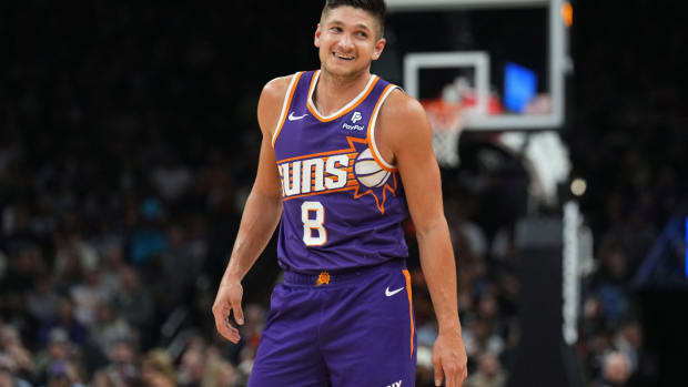 Phoenix Suns guard Grayson Allen (8) reacts against the Toronto Raptors during the first half at Footprint Center.