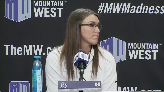 Utah State coach Kayla Ard speaks at a press conference