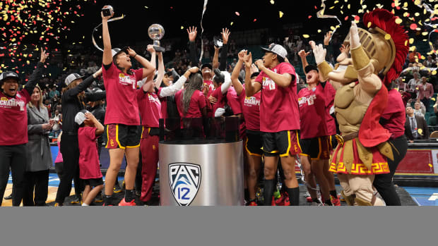 USC players celebrate after the Pac-12 tournament women’s championship game against Stanford.