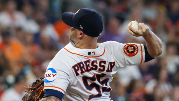 Aug 2, 2023; Houston, Texas, USA; Houston Astros relief pitcher Ryan Pressly (55) pitches against the Cleveland Guardians in the ninth inning at Minute Maid Park. Mandatory Credit: Thomas Shea-USA TODAY Sports