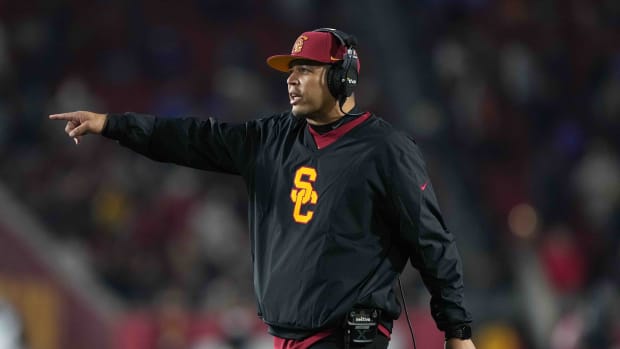 Nov 27, 2021; Los Angeles, California, USA; Southern California Trojans head coach Donte Williams gestures in the second half against the BYU Cougars at United Airlines Field at Los Angeles Memorial Coliseum.