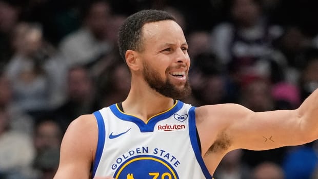 Mar 1, 2024; Toronto, Ontario, CAN; Golden State Warriors guard Stephen Curry (30) gestures to his bench during the second half against the Toronto Raptors at Scotiabank Arena. 