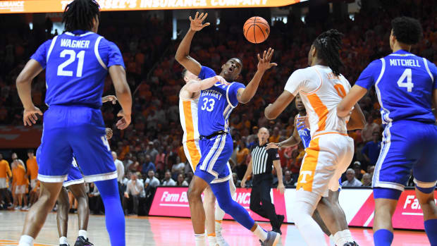 Kentucky forward Ugonna Onyenso (33) reacts during an NCAA college basketball game between Tennessee and Kentucky in Knoxville, Tenn., Saturday, March 9, 2024.