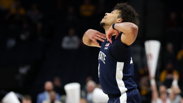 Penn State's Puff Johnson reacts after missing a shot late against Indiana in the Big Ten Basketball Tournament.