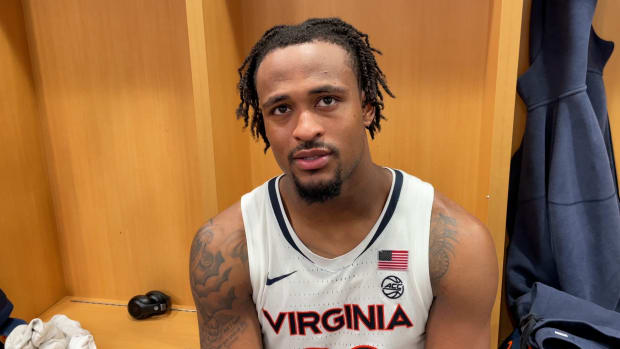 Jordan Minor talks to the media in the locker room following Virginia's 73-65 loss to NC State in the semifinals of the 2024 ACC Men's Basketball Tournament at Capital One Arena in Washington, D.C.