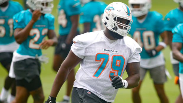 Jun 16, 2021; Miami Gardens, FL, USA; Miami Dolphins tackle Larnel Coleman (79) works out during minicamp at Baptist Health Training Facility. Mandatory Credit: Sam Navarro-USA TODAY Sports  