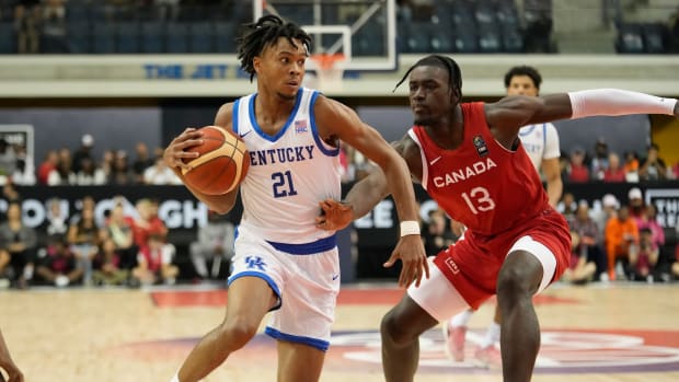 Jul 16, 2023; Toronto, Ontario, Canada; USA-Kentucky guard DJ Wagner (21) drives to the net against Canada center Enoch Boakye (13) during the first half of the Men's Gold game at Mattamy Athletic Centre. Mandatory Credit: John E. Sokolowski-USA TODAY Sports  