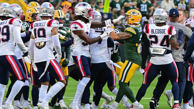 ASHWAUBENON, WI - AUGUST 05: Green Bay Packers wide receiver Allen Lazard  (13) grabs his helmet during Green Bay Packers Family Night at Lambeau  Field, on August 5, 2022 in Green Bay