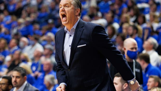 Mar 1, 2022; Lexington, Kentucky, USA; Kentucky Wildcats head coach John Calipari yells across the court during the first half against the Mississippi Rebels at Rupp Arena at Central Bank Center. Mandatory Credit: Jordan Prather-USA TODAY Sports