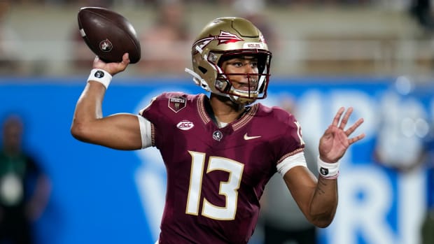 Florida State quarterback Jordan Travis throws a pass against LSU.