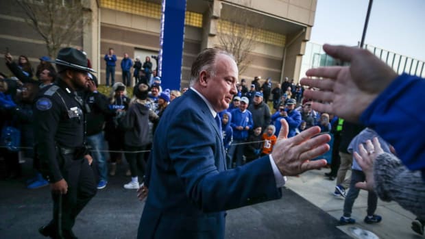 Kentucky head coach Mark Stoops greets fans before the game against Tennessee at Kroger Field Saturday night. Nov. 9, 2019 Kentucky Vs Tennessee Football 2019