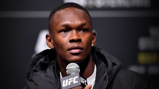 UFC middleweight champion Israel Adesanya speaks during a press conference.