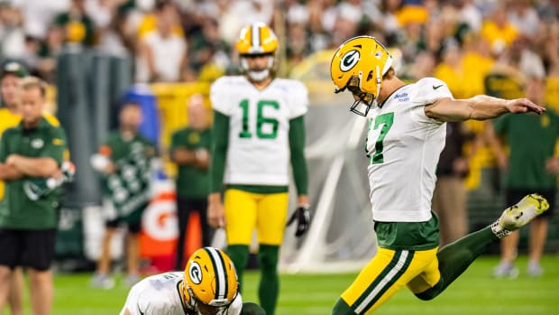 MIAMI GARDENS, FL - DECEMBER 25: Green Bay Packers safety Innis Gaines (38)  celebrates a defensive e