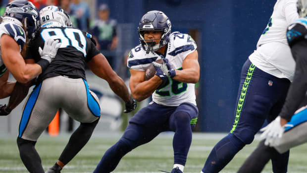 LOOK: Seahawks' Geno Smith, Kenneth Walker III point fingers at each other  in sideline spat vs. Rams 