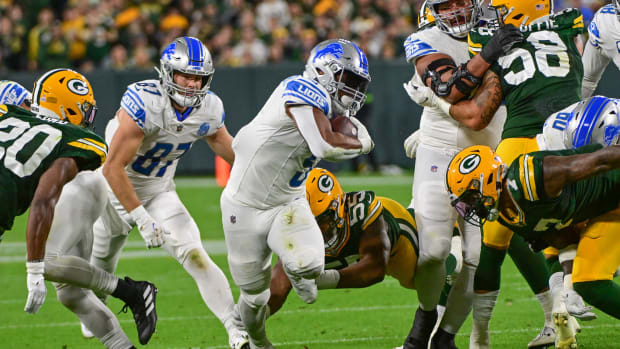 October 24, 2021: Green Bay Packers running back Aaron Jones #33 looks to  the sky before the NFL football game between the Washington Football Team  and the Green Bay Packers at Lambeau