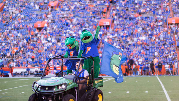 Florida Gators mascots Albert and Alberta the Alligator wave to the crowd before the game against the South Carolina Gamecocks at Steve Spurrier Field at Ben Hill Griffin Stadium in Gainesville, FL on Saturday, November 12, 2022. [Matt Pendleton/Gainesville Sun] Ncaa Football Florida Gators Vs South Carolina Gamecocks Syndication Gainesville Sun