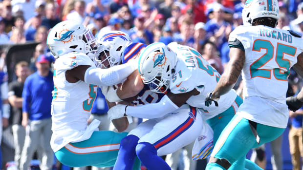 Miami Dolphins linebacker Brennan Scarlett (57) warms up on the field  before an NFL football game against the Cincinnati Bengals, Sunday, Aug.  29, 2021, in Cincinnati. (AP Photo/Zach Bolinger Stock Photo - Alamy