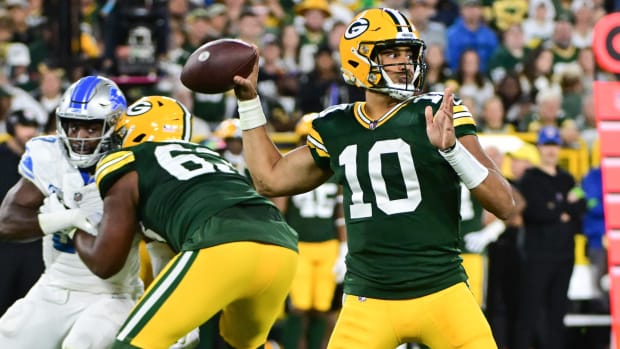 Green Bay Packers guard Aaron Jones (33) gestures during an NFL football  game against the Arizona Cardinals, Thursday, Oct. 28, 2021, in Glendale,  Ariz. (AP Photo/Darryl Webb Stock Photo - Alamy