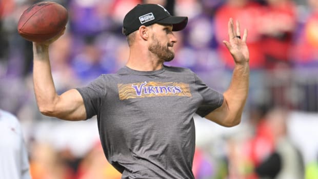 Minnesota Vikings defensive tackle Harrison Phillips walks on the field  during warm ups before the first half of an NFL football game agains the  Tennessee Titans, Saturday, Aug. 19, 2023, in Minneapolis. (