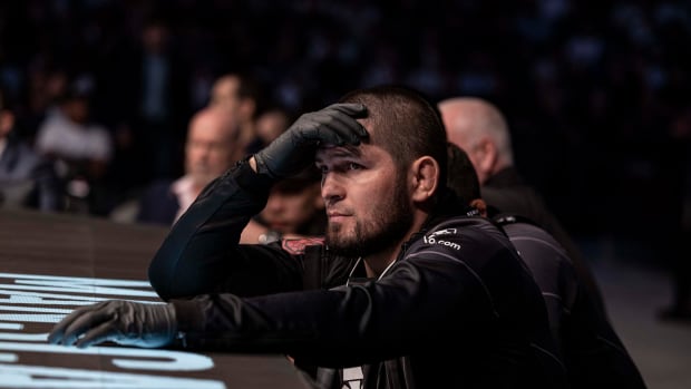 Khabib Nurmagomedov looks on during a UFC 280 fight.