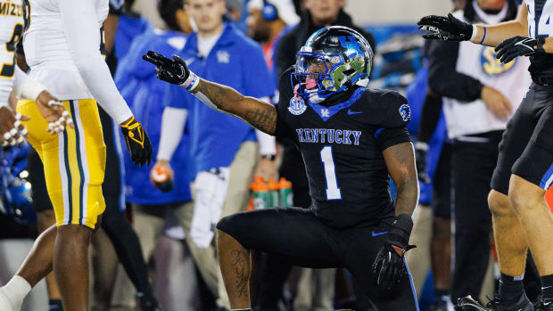 Oct 14, 2023; Lexington, Kentucky, USA; Kentucky Wildcats running back Ray Davis (1) celebrates after a run during the first quarter against the Missouri Tigers at Kroger Field. Mandatory Credit: Jordan Prather-USA TODAY Sports