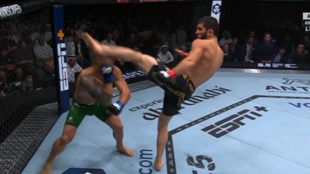 Islam Makhachev stops Alex Volkanovski via head kick at UFC 294.