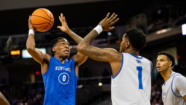 Kentucky's Rob Dillingham (0) scored during first-half action during Kentucky basketball's Blue-White scrimmage tipped off at Northern Kentucky University on Saturday, Oct. 21, 2023.