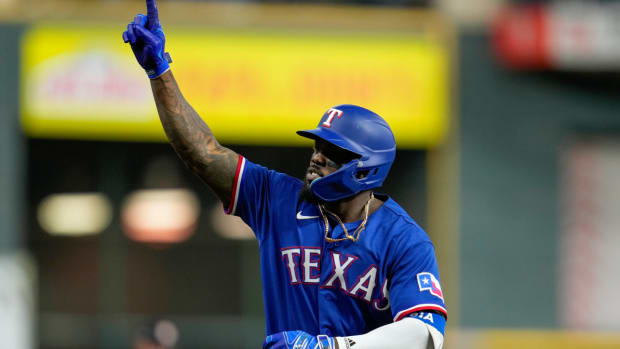 J.P. Martinez of the Texas Rangers catches a fly ball during the