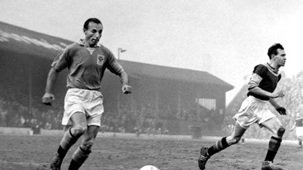 Stanley Matthews pictured (left) playing for Blackpool in 1955