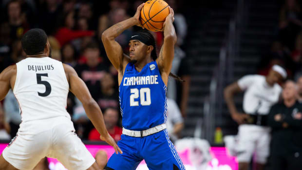 Chaminade Silverswords guard Raazhel Watkins (20) gears up to pass the ball during the first half of the basketball game between the Cincinnati Bearcats and the Chaminade Silverswords on Monday, Nov. 7, 2022, at Fifth Third Arena in Cincinnati. The Cincinnati Bearcats defeated the Chaminade Silverswords 98-55.