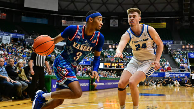 Nov 20, 2023; Honolulu, Hawaii, USA; Kansas Jayhawks guard Dajuan Harris Jr. (3) drives to the basket against Chaminade Silverswords forward Scott Ator (24) during the first period at SimpliFi Arena at Stan Sheriff Center