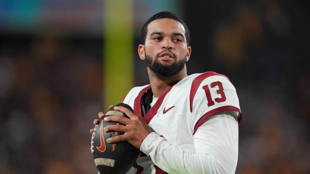 Sep 23, 2023; Tempe, Arizona, USA; USC Trojans quarterback Caleb Williams (13) warms up before a series against the Arizona State Sun Devils during the second half at Mountain America Stadium, Home of the ASU Sun Devils.