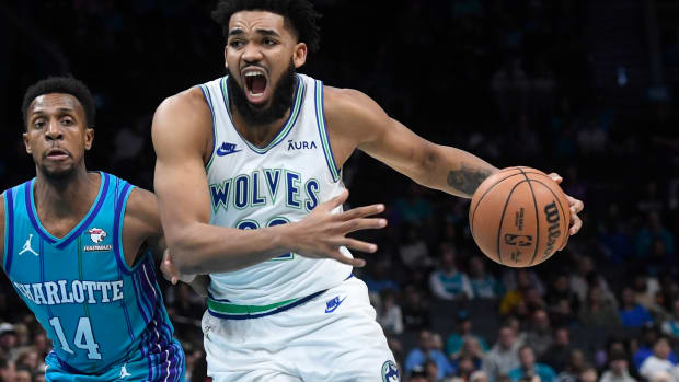 Dec 2, 2023; Charlotte, North Carolina, USA; Minnesota Timberwolves center Karl-Anthony Towns (32) drives in during the first half against the Charlotte Hornets at the Spectrum Center.