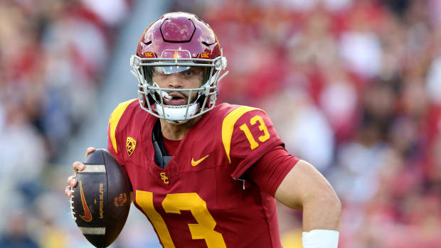 Nov 18, 2023; Los Angeles, California, USA; USC Trojans quarterback Caleb Williams (13) scrambles during the second quarter against the UCLA Bruins at United Airlines Field at Los Angeles Memorial Coliseum.