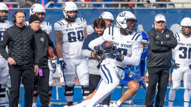 Nov 25, 2022; Boise, Idaho, USA; Utah State Aggies wide receiver Justin McGriff (10) runs during the second half against the Boise State Broncos at Albertsons Stadium. Boise State beats Utah State 42-23. Mandatory Credit: Brian Losness-USA TODAY Sports