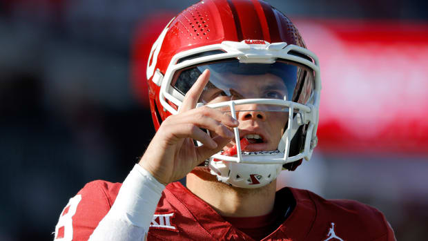Oklahoma Sooners quarterback Dillon Gabriel warms up before his team’s game against the TCU Horned Frogs on Nov. 24, 2023.