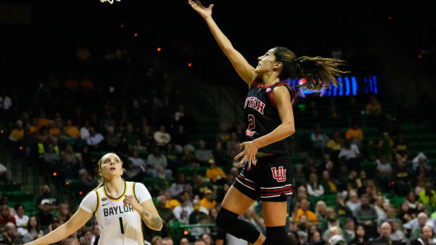 Nov 14, 2023; Waco, Texas, USA; Utah Utes guard Ines Vieira (2) scores a layup against Baylor Lady Bears guard Denae Fritz (1) during the first half at Ferrell Center.