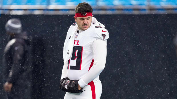 Atlanta Falcons long snapper Liam McCullough (49) stands on the field during warm ups before the game against the Carolina Panthers at Bank of America Stadium.