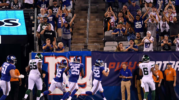 New York Giants linebacker Jake Carlock (52) scores a touchdown on an interception in the second half. The New York Giants defeat the New York Jets, 31-22, in the first preseason game at MetLife Stadium on Thursday, August 8, 2019, in East Rutherford. Nyj Vs Nyg Preseason  