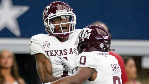 Texas A&M's Evan Stewart celebrates a big play against Arkansas