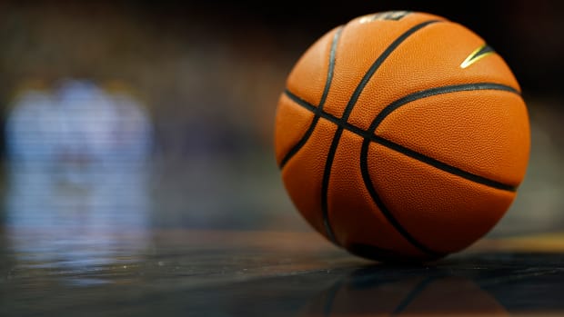 Dec 27, 2023; Charlottesville, Virginia, USA; The game ball rests on the court during a timeout in the game between the Virginia Cavaliers and Morgan State Bears in the first half at John Paul Jones Arena.