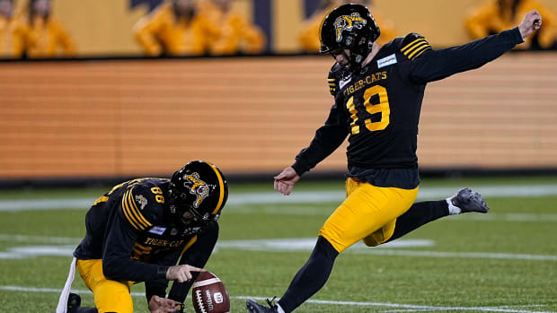 Dec 12, 2021; Hamilton, Ontario, CAN; Hamilton Tiger-Cats kicker Michael Domagala (19) kicks a field goal during the first half against the Winnipeg Blue Bombers in the 108th Grey Cup football game at Tim Hortons Field. Mandatory Credit: John E. Sokolowski-USA TODAY Sports  