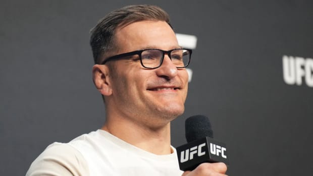 Former two-time UFC heavyweight champion Stipe Miocic speaking during a press event.