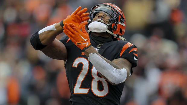 Jan 7, 2024; Cincinnati, Ohio, USA; Cincinnati Bengals running back Joe Mixon (28) reacts after scoring a touchdown against the Cleveland Browns in the first half at Paycor Stadium. Mandatory Credit: Katie Stratman-USA TODAY Sports  