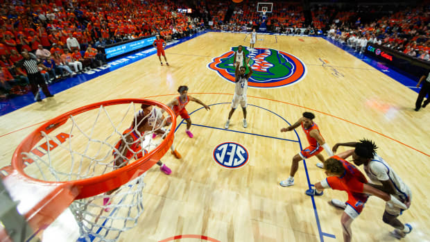 Jan 6, 2024; Gainesville, Florida, USA; Kentucky Wildcats guard Antonio Reeves (12) shoots a free throw during the second half against the Florida Gators at Exactech Arena at the Stephen C. O'Connell Center. Mandatory Credit: Matt Pendleton-USA TODAY Sports