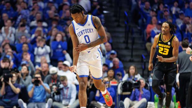 Jan 9, 2024; Lexington, Kentucky, USA; Kentucky Wildcats guard Rob Dillingham (0) celebrates a three point basket during the first half against the Missouri Tigers at Rupp Arena at Central Bank Center. Mandatory Credit: Jordan Prather-USA TODAY Sports