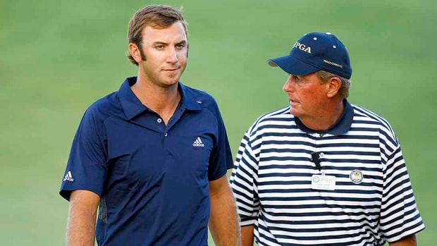 A PGA rules official and Dustin Johnson at the 2010 PGA Championship at Whistling Straits.