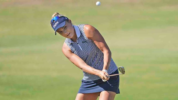 Lexi Thompson hits an approach shot on the first hole during the final round of the 2023 LPGA The Ascendant golf tournament in The Colony, Texas.