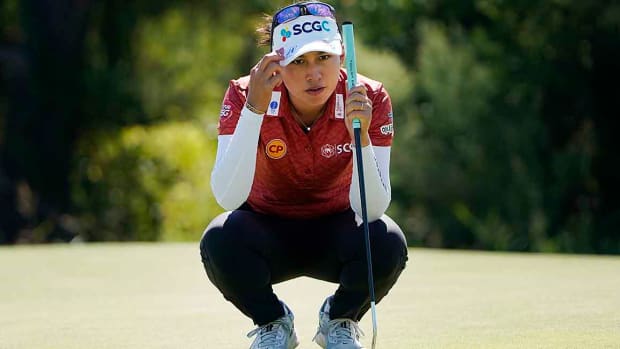 Thailand's Atthaya Thitikul lines up a putt during the 2022LPGA The Ascendant golf tournament in The Colony, Texas.